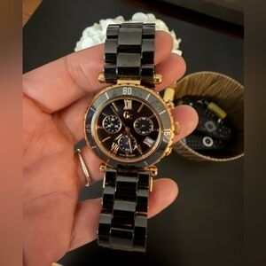 Guess Women's Black and Gold Watch